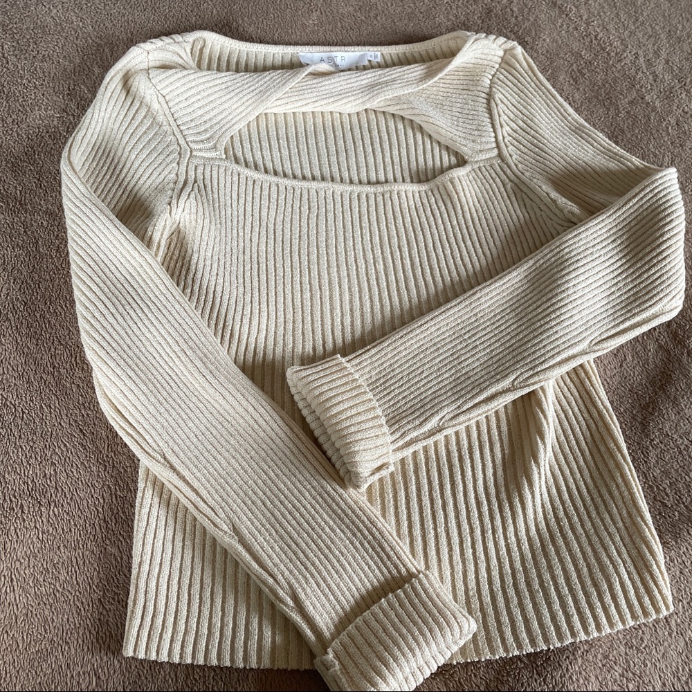 Cream Astr Sweater with a twist neckline